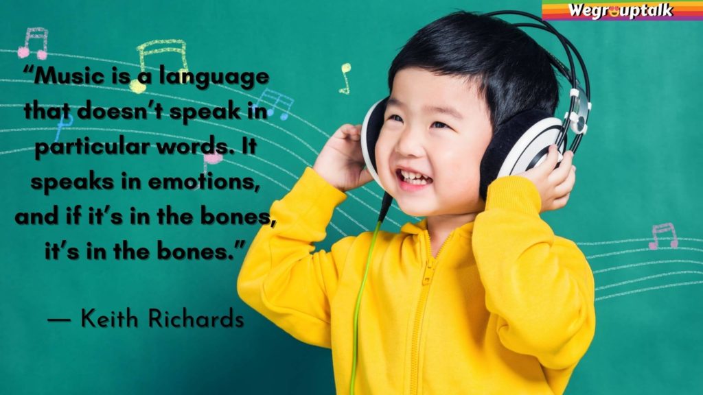 Small child is enjoying the music in his headphones. There is a quote from Keith Richards also in the image, "Music is a language that doesn't speak particular words. I speak in emotions, and it's in the bones, it's in the bones."